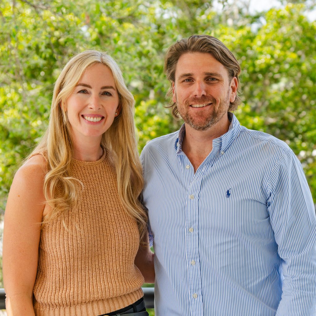 Woman and Man with greenery behind