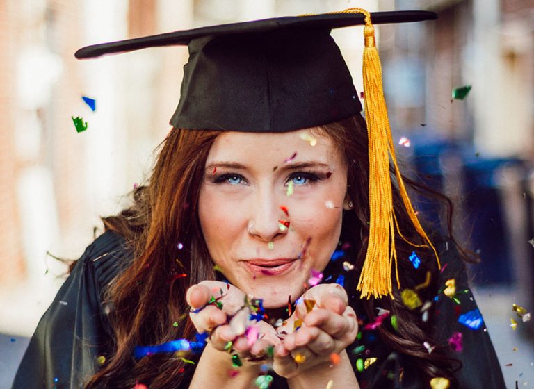 Woman with graduation cap