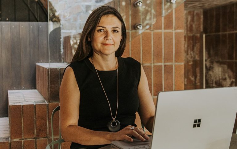 Business woman sitting at computer