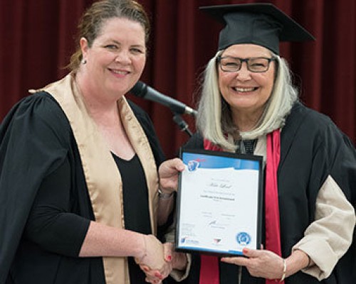 Tricia presenting certificate