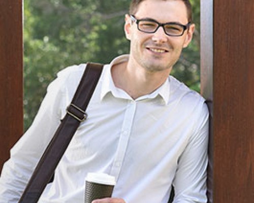 Man with briefcase and coffee