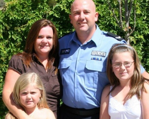 policeman with family