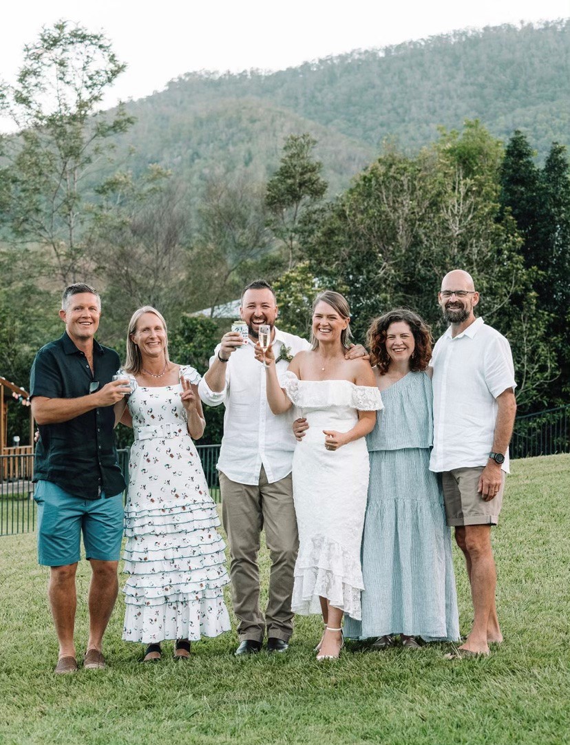 Dan, Jody, Brett, Cath, Tricia & Randall celebrating borders being open 