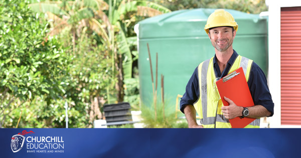 man in high vis with hard hat